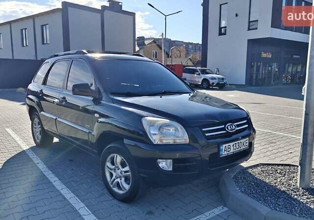 Черный Киа Sportage, объемом двигателя 1.98 л и пробегом 234 тыс. км за 8000 $, фото 1 на Automoto.ua