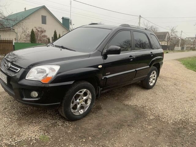 Черный Киа Sportage, объемом двигателя 2 л и пробегом 315 тыс. км за 6900 $, фото 1 на Automoto.ua