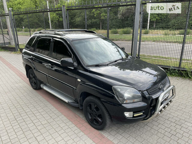 Черный Киа Sportage, объемом двигателя 2 л и пробегом 170 тыс. км за 5900 $, фото 1 на Automoto.ua
