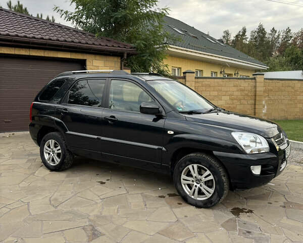 Черный Киа Sportage, объемом двигателя 2 л и пробегом 257 тыс. км за 10300 $, фото 1 на Automoto.ua