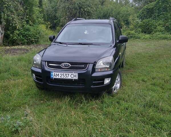 Чорний Кіа Sportage, об'ємом двигуна 2 л та пробігом 248 тис. км за 8600 $, фото 1 на Automoto.ua