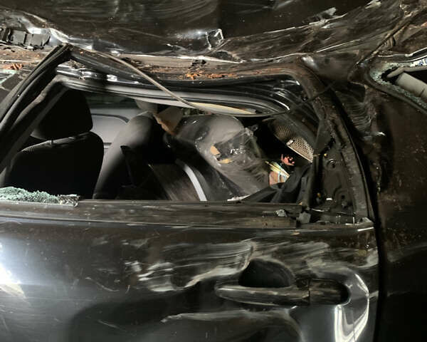 Чорний Кіа Sportage, об'ємом двигуна 2 л та пробігом 146 тис. км за 3500 $, фото 1 на Automoto.ua
