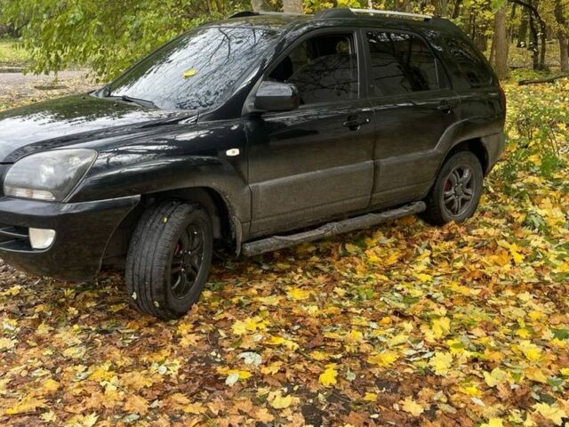 Чорний Кіа Sportage, об'ємом двигуна 2 л та пробігом 301 тис. км за 7300 $, фото 1 на Automoto.ua