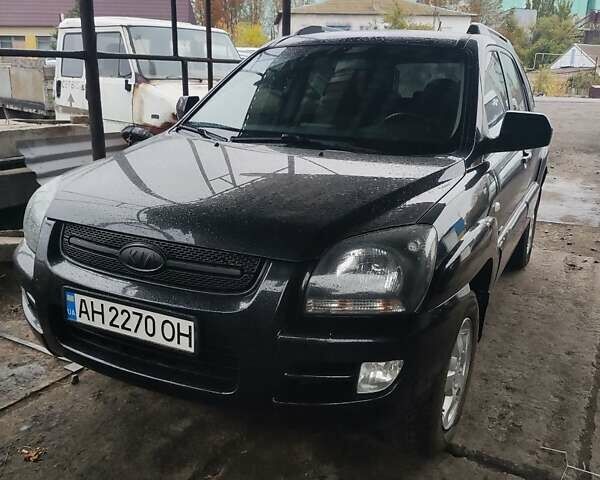 Черный Киа Sportage, объемом двигателя 2 л и пробегом 147 тыс. км за 8300 $, фото 1 на Automoto.ua