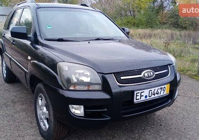 Черный Киа Sportage, объемом двигателя 2 л и пробегом 275 тыс. км за 7600 $, фото 1 на Automoto.ua