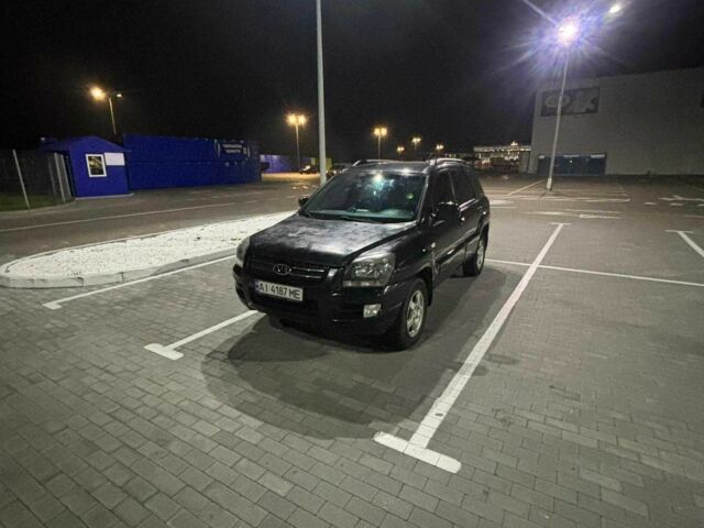 Черный Киа Sportage, объемом двигателя 2 л и пробегом 263 тыс. км за 6700 $, фото 1 на Automoto.ua