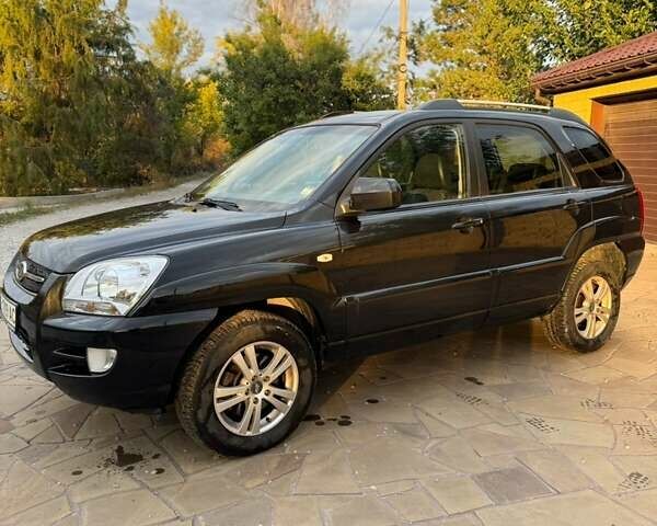 Чорний Кіа Sportage, об'ємом двигуна 1.99 л та пробігом 257 тис. км за 8500 $, фото 1 на Automoto.ua