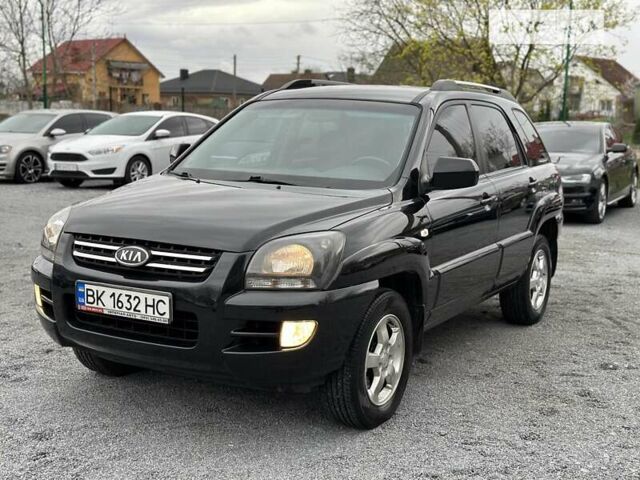 Чорний Кіа Sportage, об'ємом двигуна 2 л та пробігом 238 тис. км за 7450 $, фото 1 на Automoto.ua