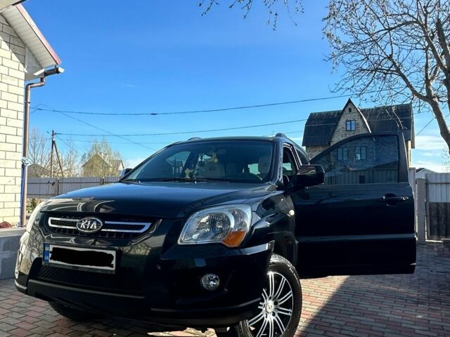 Черный Киа Sportage, объемом двигателя 2 л и пробегом 195 тыс. км за 9000 $, фото 1 на Automoto.ua