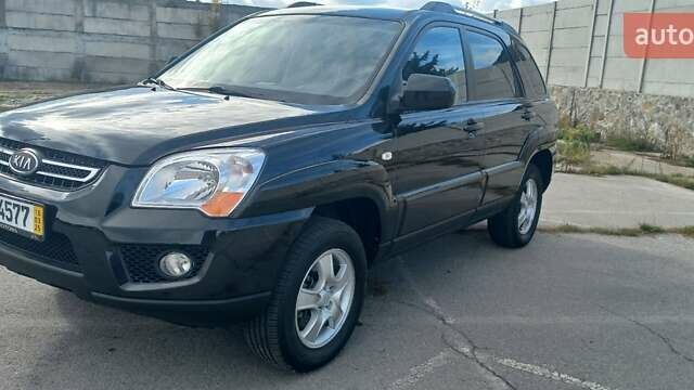 Чорний Кіа Sportage, об'ємом двигуна 2 л та пробігом 167 тис. км за 8999 $, фото 1 на Automoto.ua