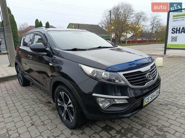Черный Киа Sportage, объемом двигателя 2 л и пробегом 153 тыс. км за 11800 $, фото 1 на Automoto.ua