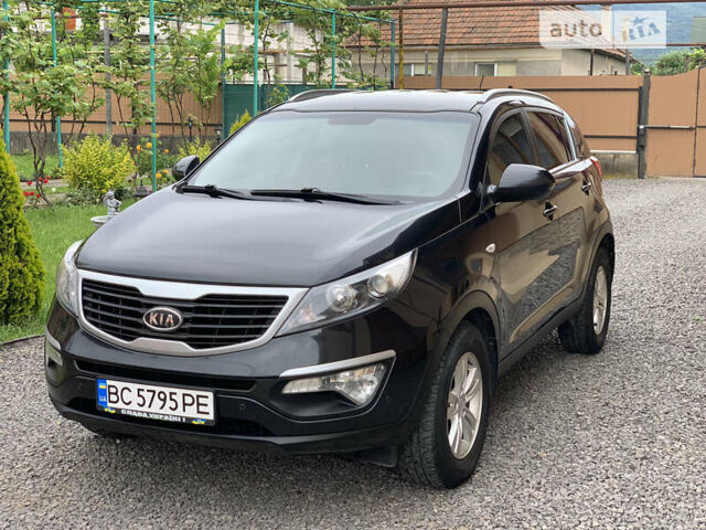 Черный Киа Sportage, объемом двигателя 2 л и пробегом 203 тыс. км за 11900 $, фото 1 на Automoto.ua