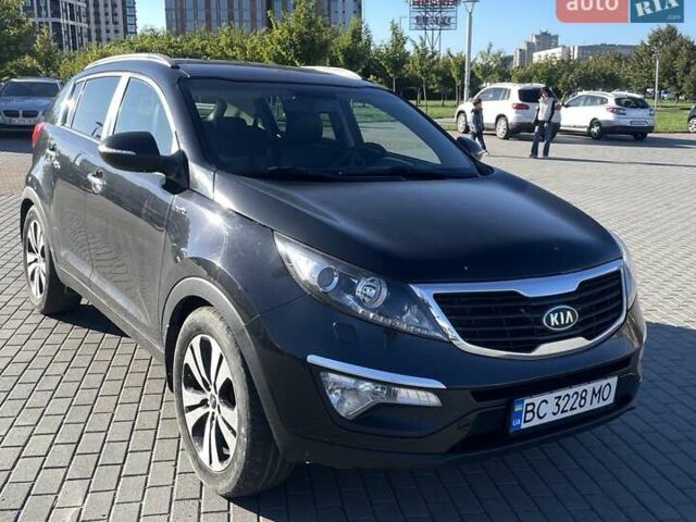 Черный Киа Sportage, объемом двигателя 2 л и пробегом 308 тыс. км за 12500 $, фото 1 на Automoto.ua