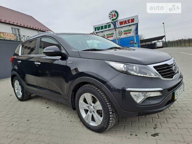 Чорний Кіа Sportage, об'ємом двигуна 2 л та пробігом 128 тис. км за 11700 $, фото 1 на Automoto.ua