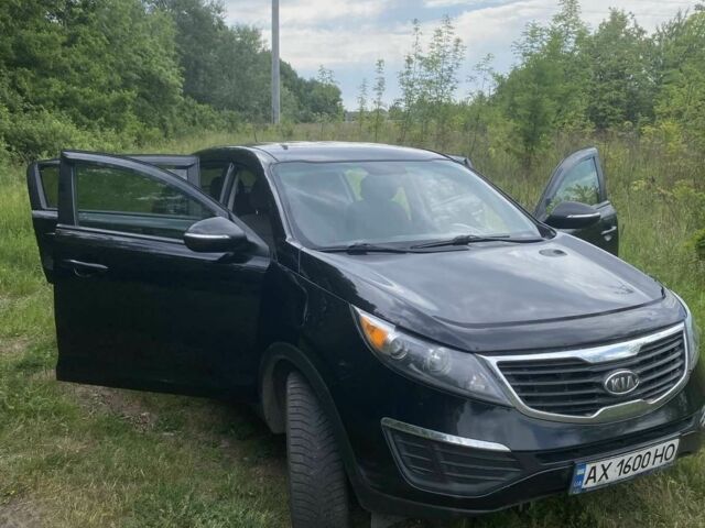 Чорний Кіа Sportage, об'ємом двигуна 2.4 л та пробігом 165 тис. км за 10000 $, фото 1 на Automoto.ua