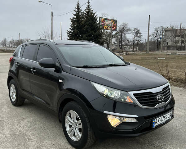 Черный Киа Sportage, объемом двигателя 2 л и пробегом 148 тыс. км за 12600 $, фото 1 на Automoto.ua