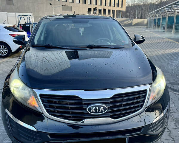 Чорний Кіа Sportage, об'ємом двигуна 2.4 л та пробігом 184 тис. км за 11100 $, фото 1 на Automoto.ua