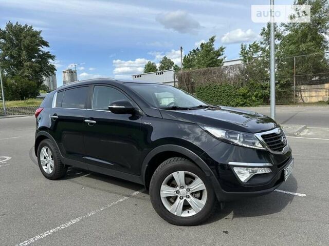 Чорний Кіа Sportage, об'ємом двигуна 2 л та пробігом 341 тис. км за 10600 $, фото 1 на Automoto.ua