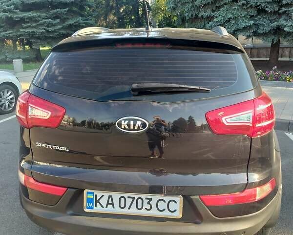 Чорний Кіа Sportage, об'ємом двигуна 2 л та пробігом 133 тис. км за 12700 $, фото 1 на Automoto.ua