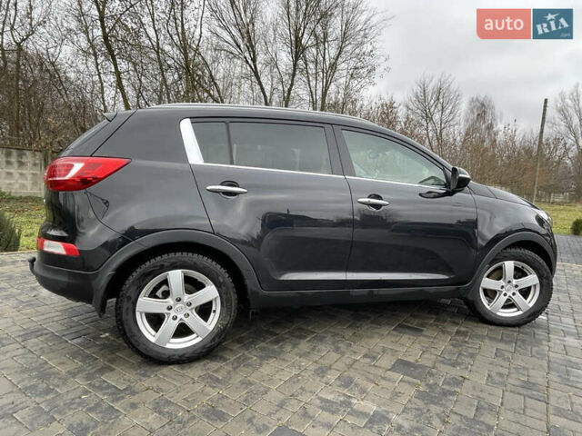 Черный Киа Sportage, объемом двигателя 1.6 л и пробегом 198 тыс. км за 12600 $, фото 1 на Automoto.ua