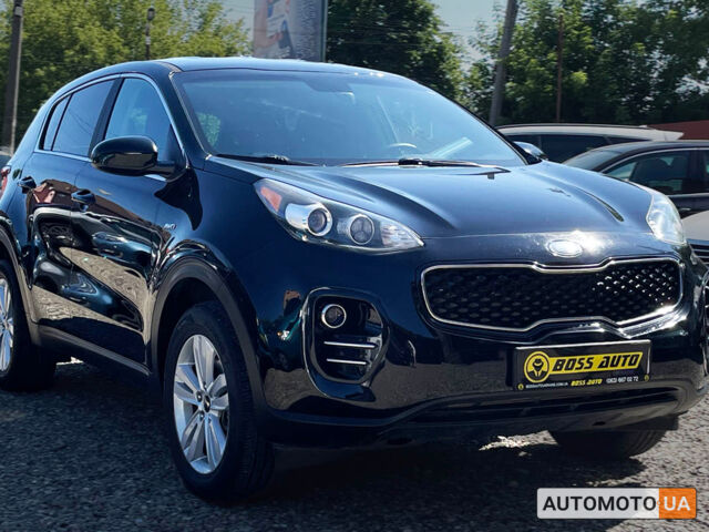 Черный Киа Sportage, объемом двигателя 2.4 л и пробегом 64 тыс. км за 17950 $, фото 1 на Automoto.ua