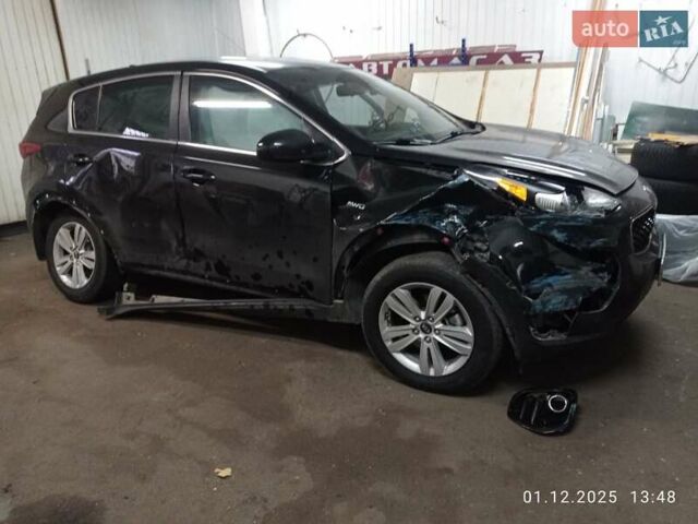 Черный Киа Sportage, объемом двигателя 2.36 л и пробегом 85 тыс. км за 13000 $, фото 1 на Automoto.ua
