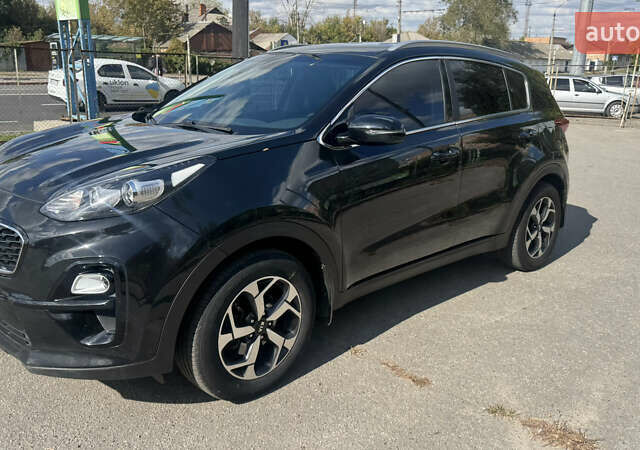 Чорний Кіа Sportage, об'ємом двигуна 1.6 л та пробігом 90 тис. км за 14999 $, фото 1 на Automoto.ua