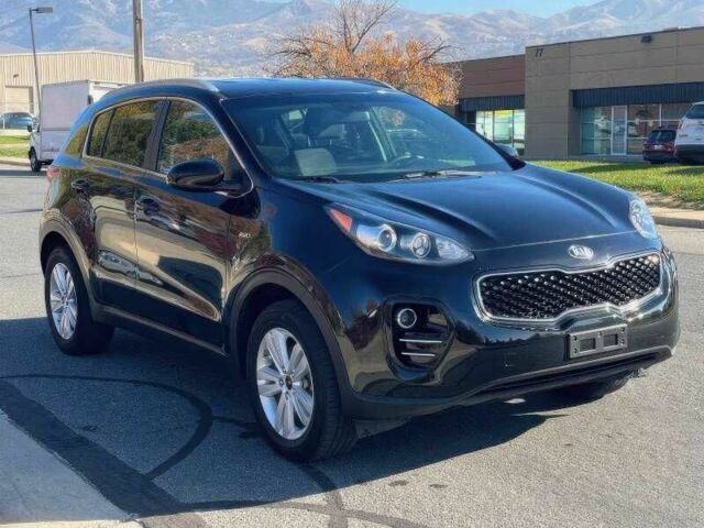 Черный Киа Sportage, объемом двигателя 2.4 л и пробегом 78 тыс. км за 10500 $, фото 1 на Automoto.ua