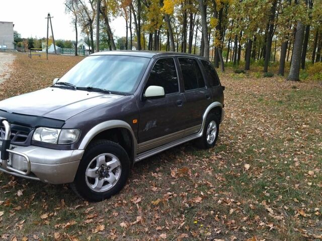 Фіолетовий Кіа Sportage, об'ємом двигуна 2 л та пробігом 200 тис. км за 3600 $, фото 1 на Automoto.ua