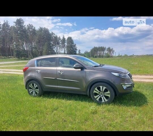 Коричневый Киа Sportage, объемом двигателя 2 л и пробегом 175 тыс. км за 14500 $, фото 1 на Automoto.ua