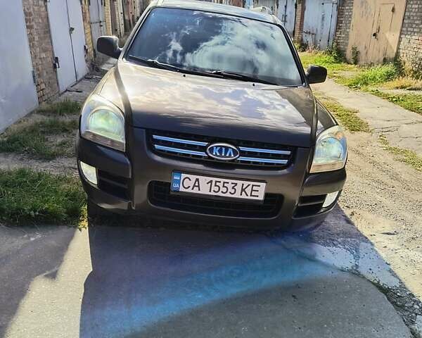 Коричневий Кіа Sportage, об'ємом двигуна 1.99 л та пробігом 242 тис. км за 8700 $, фото 1 на Automoto.ua