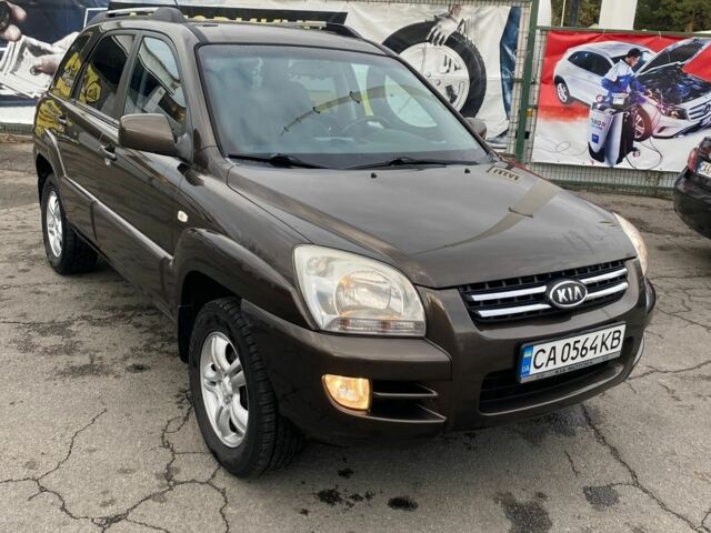 Коричневый Киа Sportage, объемом двигателя 2 л и пробегом 241 тыс. км за 8000 $, фото 1 на Automoto.ua