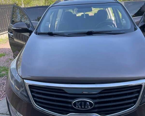 Коричневий Кіа Sportage, об'ємом двигуна 1.59 л та пробігом 235 тис. км за 10200 $, фото 1 на Automoto.ua