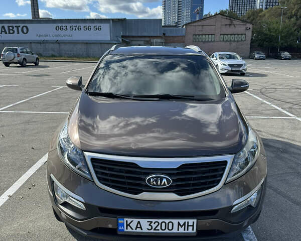 Коричневий Кіа Sportage, об'ємом двигуна 2 л та пробігом 188 тис. км за 14500 $, фото 1 на Automoto.ua