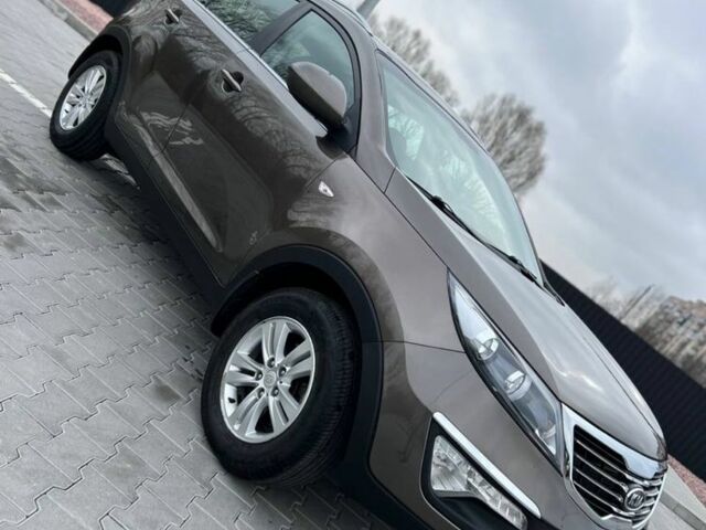 Коричневий Кіа Sportage, об'ємом двигуна 2 л та пробігом 156 тис. км за 10999 $, фото 1 на Automoto.ua