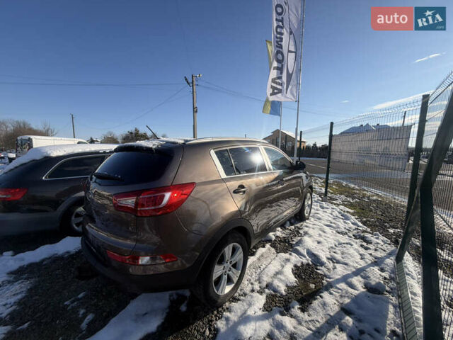 Коричневий Кіа Sportage, об'ємом двигуна 1.6 л та пробігом 236 тис. км за 11600 $, фото 1 на Automoto.ua