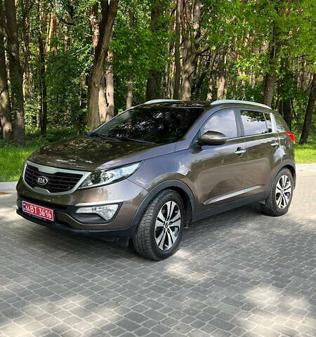 Коричневий Кіа Sportage, об'ємом двигуна 2 л та пробігом 140 тис. км за 12800 $, фото 1 на Automoto.ua