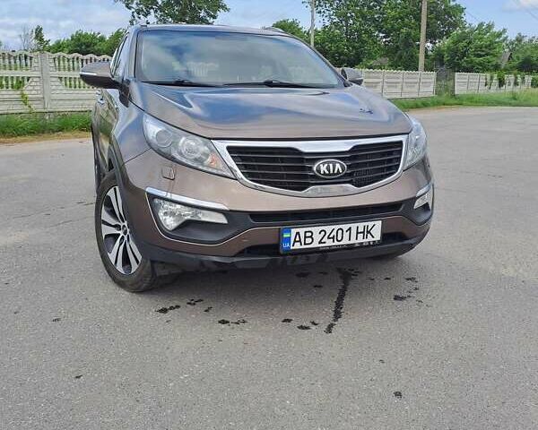 Коричневый Киа Sportage, объемом двигателя 2 л и пробегом 224 тыс. км за 14000 $, фото 1 на Automoto.ua