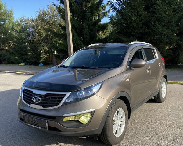 Коричневий Кіа Sportage, об'ємом двигуна 2 л та пробігом 173 тис. км за 11666 $, фото 1 на Automoto.ua