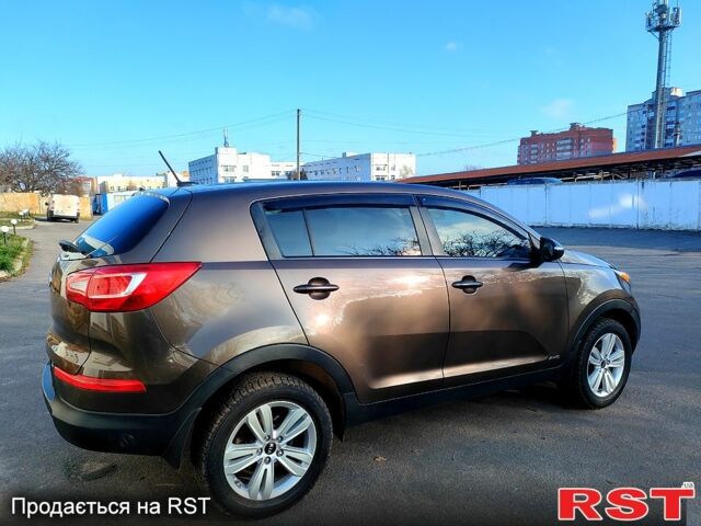 Коричневий Кіа Sportage, об'ємом двигуна 2.4 л та пробігом 160 тис. км за 11650 $, фото 1 на Automoto.ua