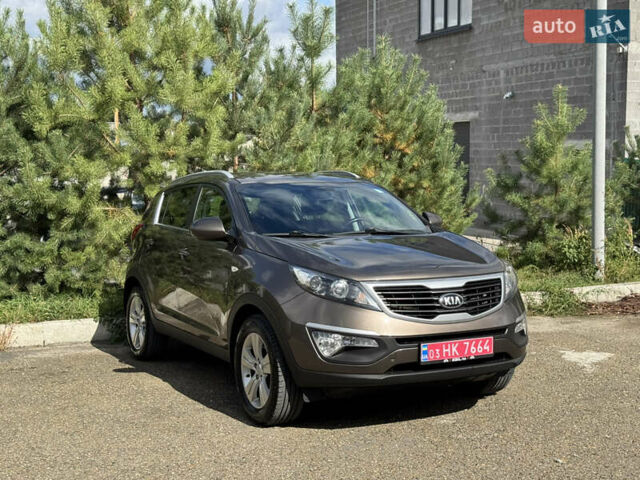 Коричневый Киа Sportage, объемом двигателя 1.69 л и пробегом 145 тыс. км за 12900 $, фото 1 на Automoto.ua