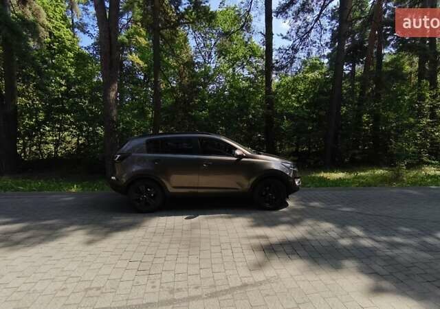 Коричневый Киа Sportage, объемом двигателя 2 л и пробегом 150 тыс. км за 16500 $, фото 1 на Automoto.ua