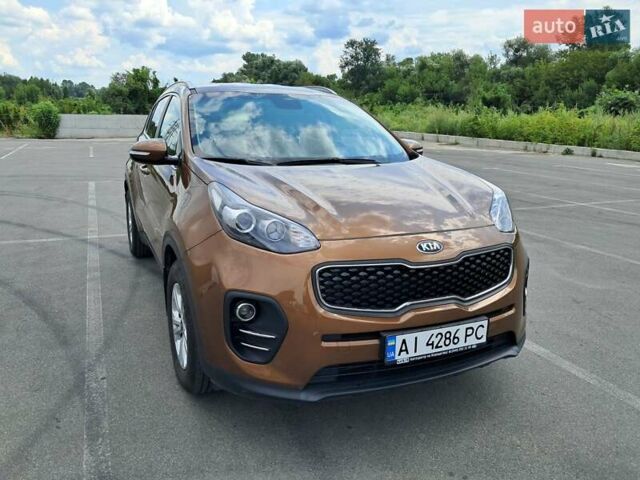 Коричневий Кіа Sportage, об'ємом двигуна 2 л та пробігом 108 тис. км за 16600 $, фото 1 на Automoto.ua