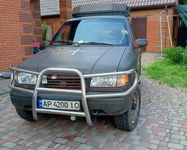 Красный Киа Sportage, объемом двигателя 2 л и пробегом 309 тыс. км за 3300 $, фото 1 на Automoto.ua