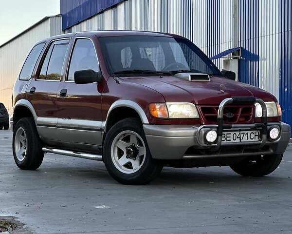 Красный Киа Sportage, объемом двигателя 2 л и пробегом 350 тыс. км за 2999 $, фото 1 на Automoto.ua