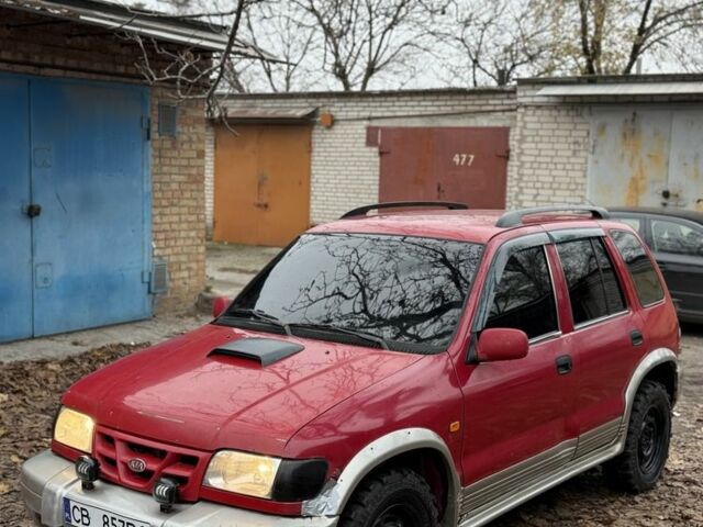 Красный Киа Sportage, объемом двигателя 2 л и пробегом 200 тыс. км за 1000 $, фото 1 на Automoto.ua