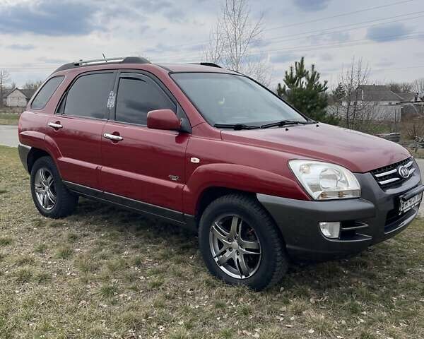 Красный Киа Sportage, объемом двигателя 1.99 л и пробегом 224 тыс. км за 7799 $, фото 1 на Automoto.ua