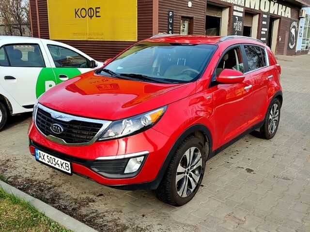 Красный Киа Sportage, объемом двигателя 2.4 л и пробегом 106 тыс. км за 12000 $, фото 1 на Automoto.ua