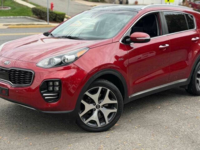 Красный Киа Sportage, объемом двигателя 2 л и пробегом 51 тыс. км за 10000 $, фото 1 на Automoto.ua