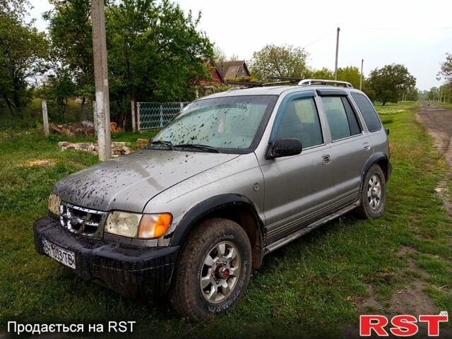 Серый Киа Sportage, объемом двигателя 2 л и пробегом 266 тыс. км за 3200 $, фото 1 на Automoto.ua